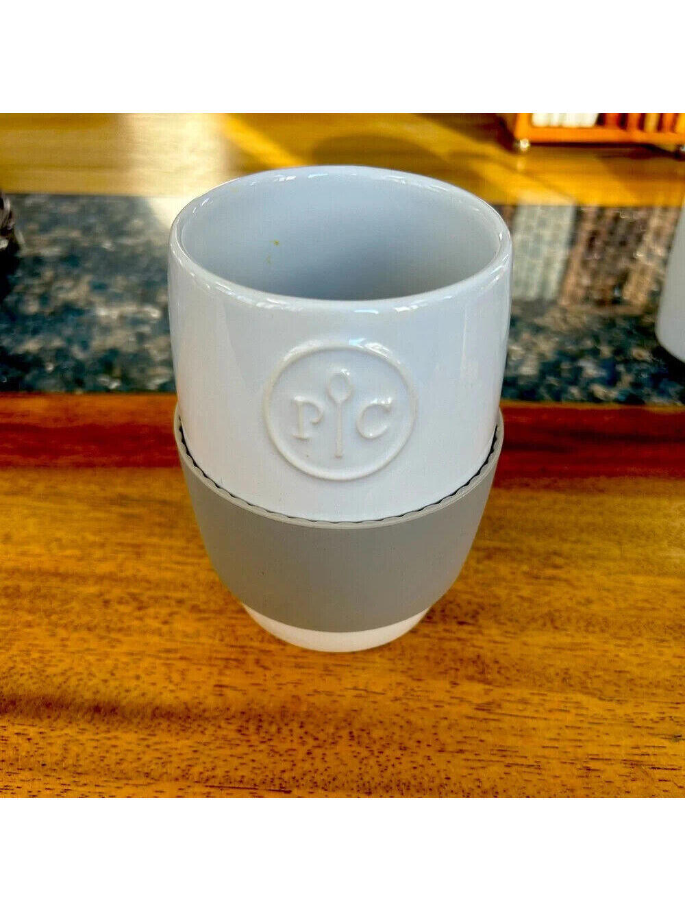 Pampered Chef mug with silicone sleeve. No lid.